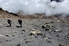 Kathy-and-Passot-heading-down-Kili20200114_102916